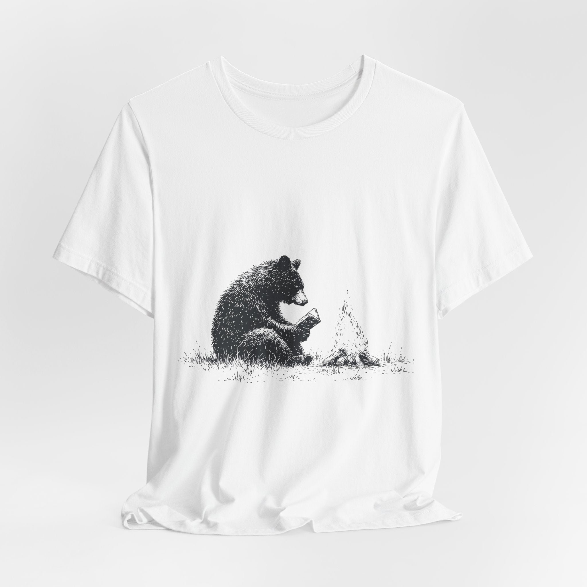 Campfire Reading Bear Unisex T-Shirt – Cozy Book Lover Graphic Tee